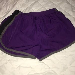 Purple with black and grey shorts